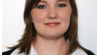 Justine L.