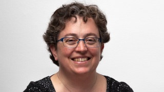 Corinne T.